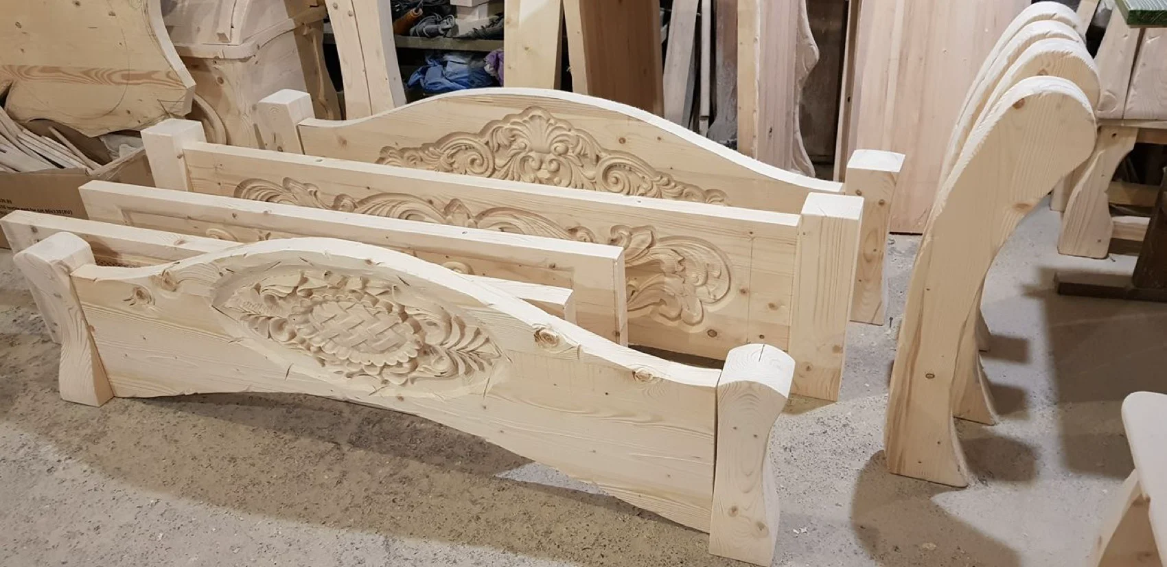 Carved bed frames in the workshop