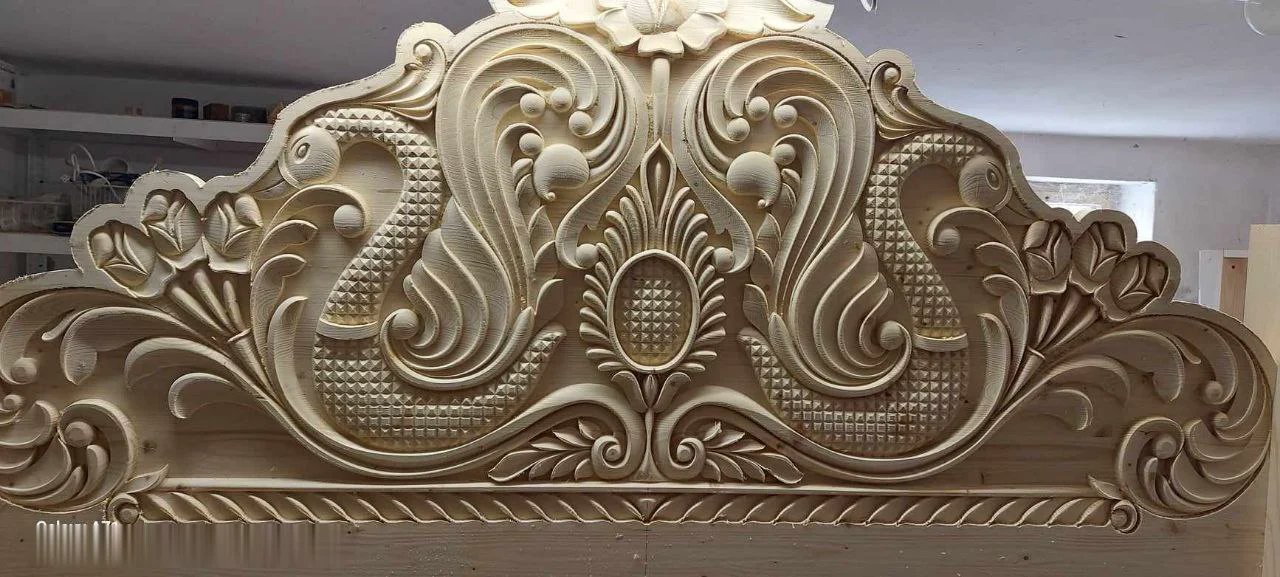 Ornate carved headboard crest
