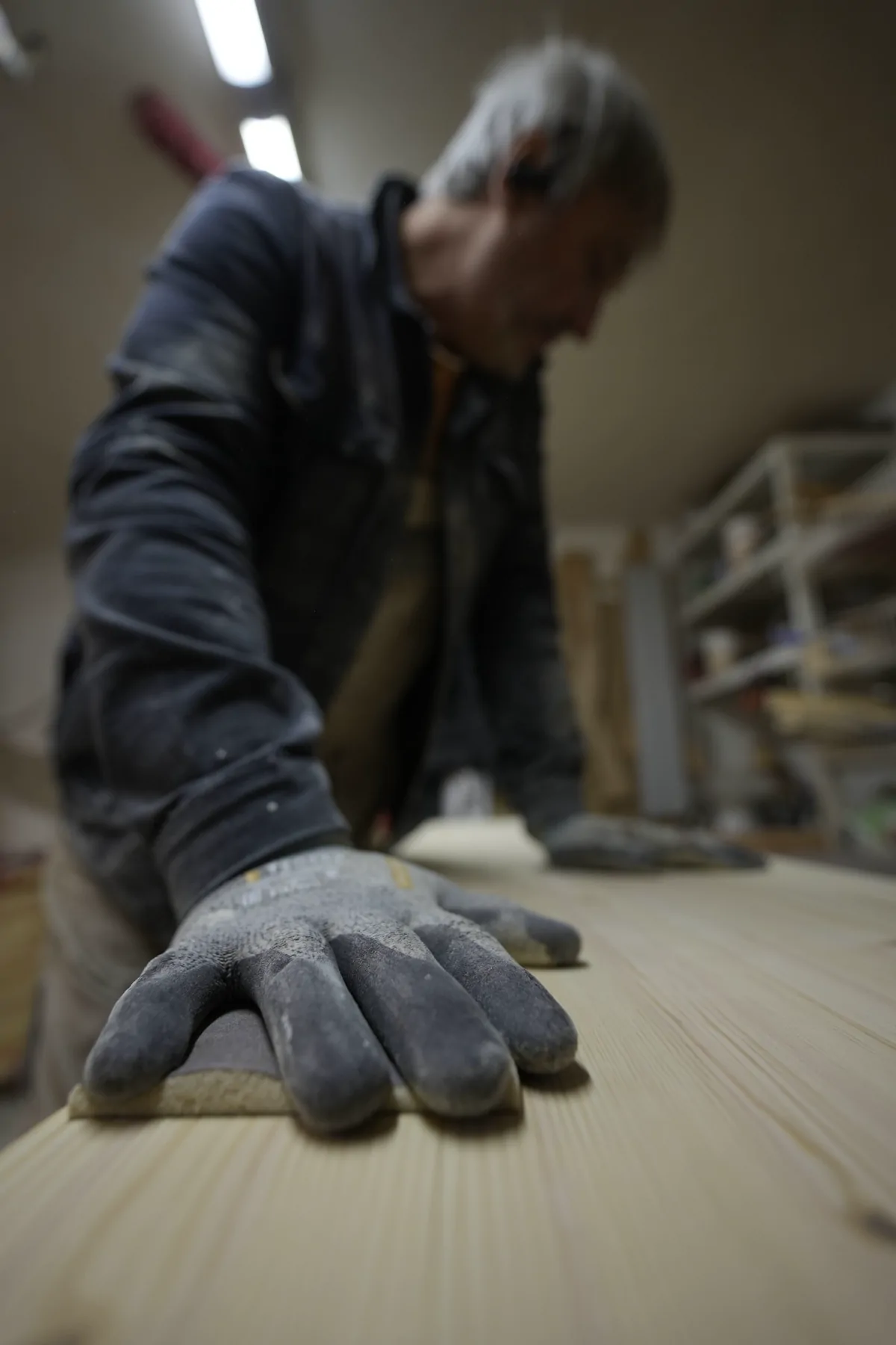 Craftsman sanding solid wood