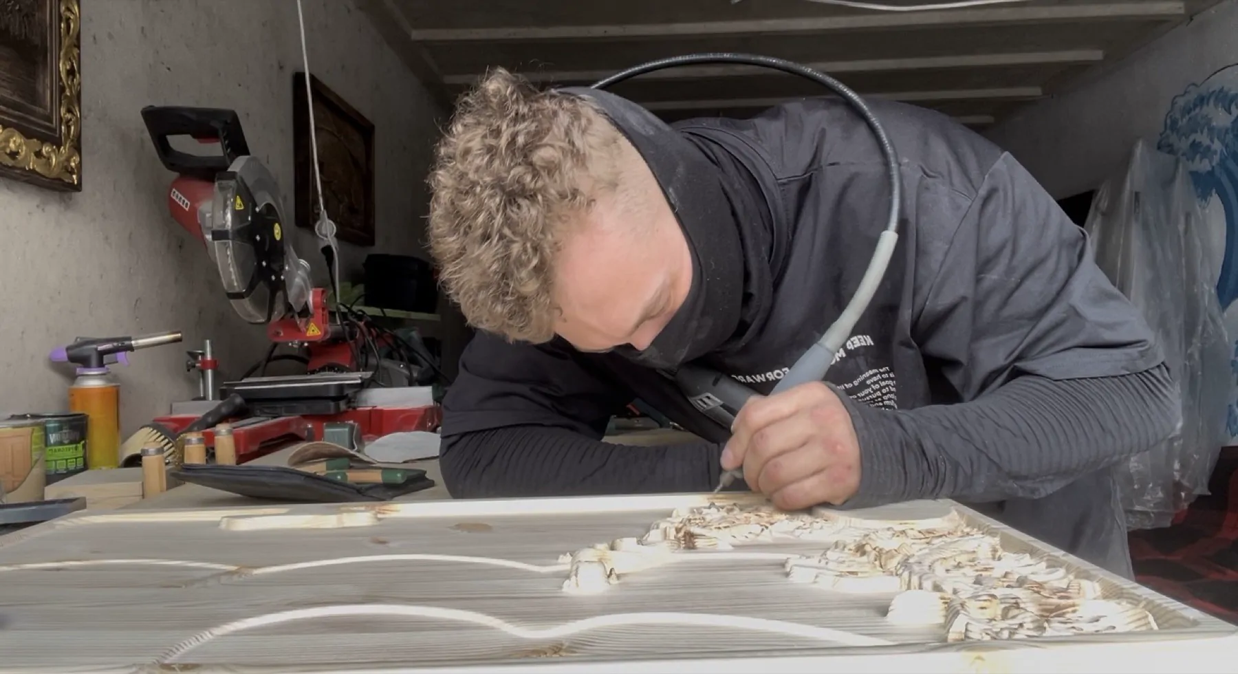 Master carving a detail by hand