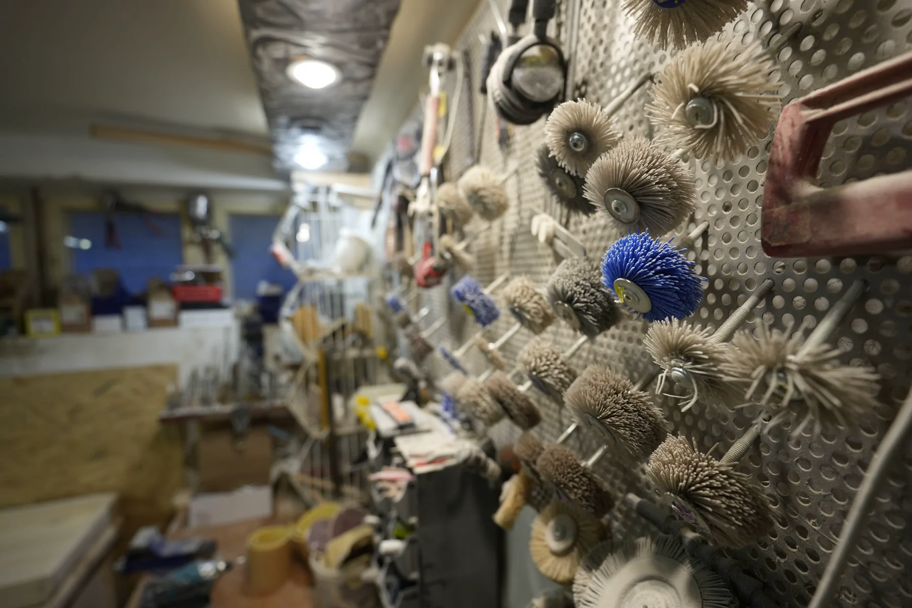 Finishing brushes on the tool wall